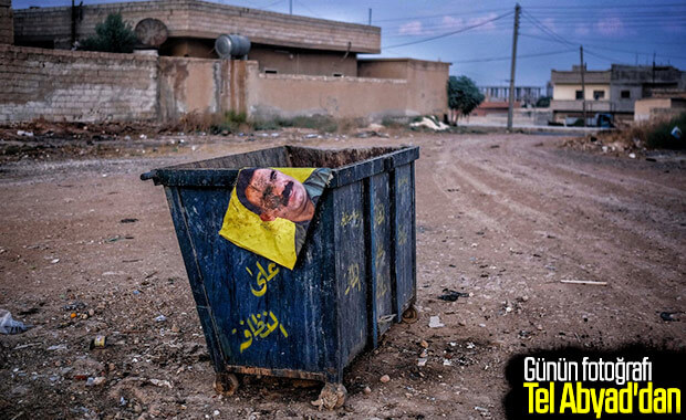 Tel Abyad'da Öcalan fotoğrafı çöp oldu..