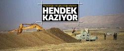 Peşmerge ele geçirdiği köylere hendek kazıyor..