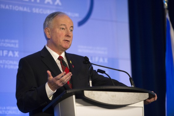 The Honourable Rob Nicholson (right), P.C., Q.C., M.P. for Niagara Falls, Minister of National Defence, speaks with the media during the opening of the Halifax International Security Forum in Halifax, Nova Scotia, on November 21, 2014.Photo: Leading Seaman Peter Frew, Formation Imaging Services© 2014 DND-MND Canada